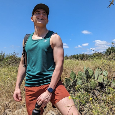 Runyon Mens Red Rock (Rust) TrailStash 7 Inch Gravel Short a performance short with zipper pockets that works great for Hiking