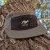 Runyon Made In USA Camp Hat - Charcoal (Dark Grey,Graphite) Camp Hat with Blac Front Panel with Reflective Emblem - Moisture Wicking, Mesh Side Panels, Lightweight, BreathableRunyon Made In USA Camp Hat - Charcoal (Dark Grey,Graphite) Camp Hat with Blac Front Panel with Reflective Emblem - Moisture Wicking, Mesh Side Panels, Lightweight, Breathable
