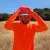 Runyon Men's Hot Orange Safety Orange Unisex Pocketed Sun Hoodie - Drawcord, Inside Pockets, Watch Window, Lightweight, UPF Sun Protection, Minimal Branding