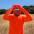 Runyon Men's Hot Orange Safety Orange Unisex Pocketed Sun Hoodie - Drawcord, Inside Pockets, Watch Window, Lightweight, UPF Sun Protection, Minimal Branding