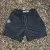 Runyon SupraPlush™ black 5-inch men's running shorts with 2-in-1 compression liner, lightweight performance shell, dual side pockets, phone pockets, handcrafted in Los Angeles, Made in USA.