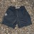 Runyon SupraPlush™ black 5-inch men's running shorts with 2-in-1 compression liner, lightweight performance shell, dual side pockets, phone pockets, handcrafted in Los Angeles, Made in USA.
