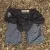 Runyon SupraPlush™ black 5-inch men's running shorts with 2-in-1 compression liner, lightweight performance shell, dual side pockets, phone pockets, handcrafted in Los Angeles, Made in USA.