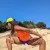 Runyon Women's Neon Orange Safety Fluorescent Orange Sleeveless Muscle Tee Performance Tank Top American Made In USA