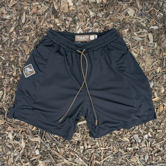 Runyon SupraPlush™ black 5-inch men's running shorts with 2-in-1 compression liner, lightweight performance shell, dual side pockets, phone pockets, handcrafted in Los Angeles, Made in USA.