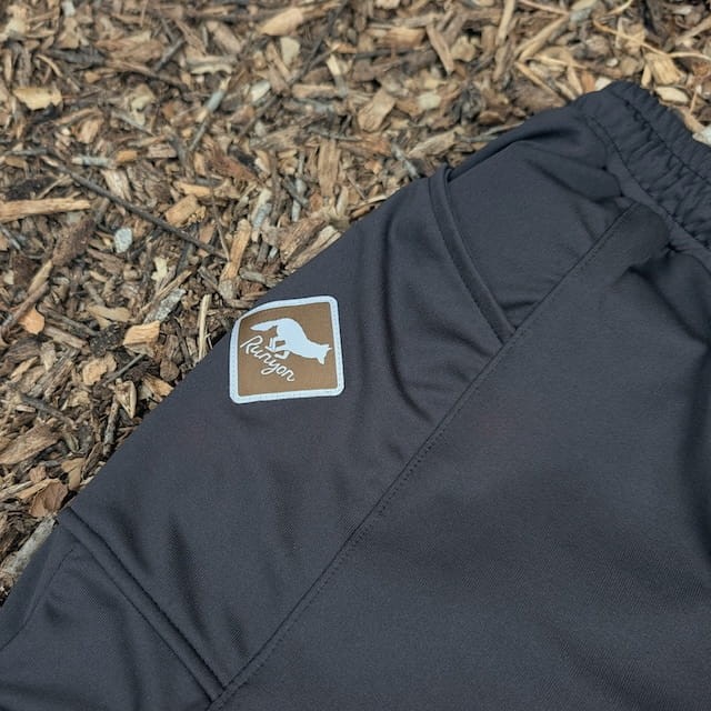 Runyon SupraPlush™ black 5-inch men's running shorts with 2-in-1 compression liner, lightweight performance shell, dual side pockets, phone pockets, handcrafted in Los Angeles, Made in USA.