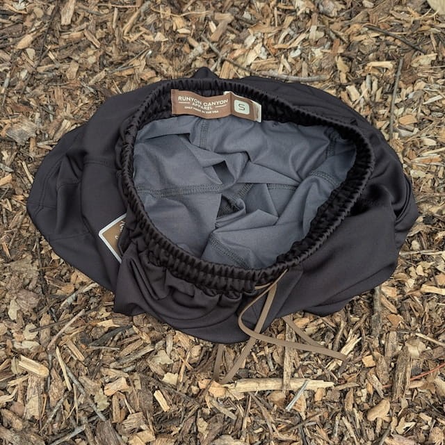 Runyon SupraPlush™ black 5-inch men's running shorts with 2-in-1 compression liner, lightweight performance shell, dual side pockets, phone pockets, handcrafted in Los Angeles, Made in USA.