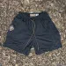 Runyon SupraPlush™ black 5-inch men's running shorts with 2-in-1 compression liner, lightweight performance shell, dual side pockets, phone pockets, handcrafted in Los Angeles, Made in USA.