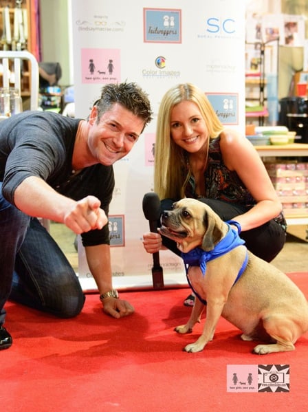 Red Carpet host Stephanie Haney and Harry Winston the pup