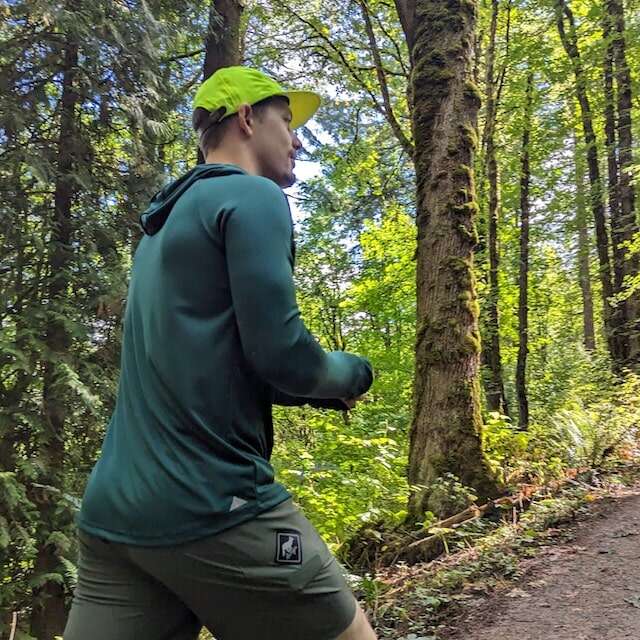 Forest Green long sleeve technical hoodie shirts with built-in thumbholes UPF protection for running, hiking, fitness, gym, workouts.  American Made In USA. Runyon Canyon Apparel